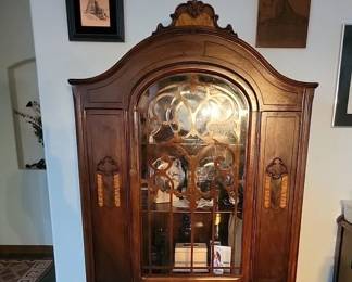 Sterling Furniture Company. Has interior light. Late 1800's. Has matching sideboard. Selling as a set.