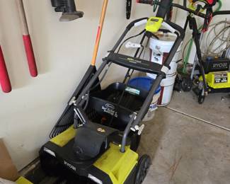 Battery operated snow blower