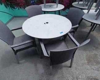 DBB825 (2) Gray Round Tables With (8) Gray Woven Vinyl Chairs