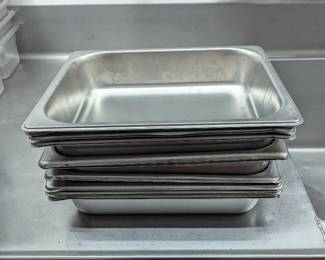 DBB497 - Ten Stainless Steel Pans