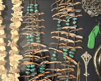 Spiny oyster fetish necklaces and Alaskan bone necklace, 1940's jewelry to the right.