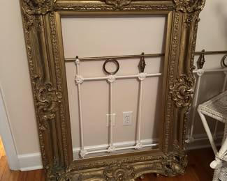 Fabulous wood and plaster frame with aged gold patina, appears to be in all original condition.