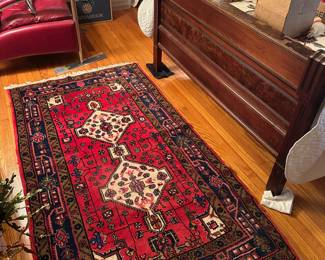 Excellent wool rug, vegetable dyes, some stretching in the corners.