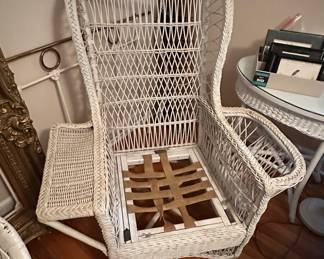 The wicker lounging chair with easy access for beverages and books.
