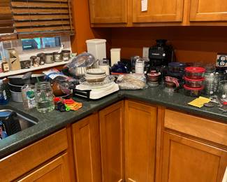 Lots of glass cookware and some nice appliances. Also have Oneida stainless flatware and a couple of All Clad saucepans.