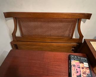 Bed with woven rattan accent and Lane cedar chest.