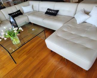 Chateau Dax Sectional.  Glass Coffee Table.