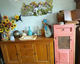 Buffet and primitive cabinet. Floral decore