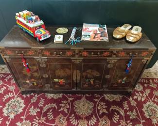Colorful wood and brass tv stand