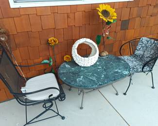 Iron chairs and marble table