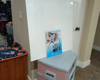 Large blank canvas, pink storage drawers