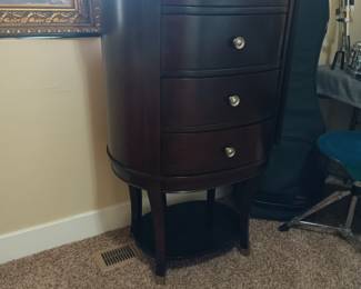 Large oval chest of drawers