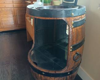 Old barrel cut out with glass shelves