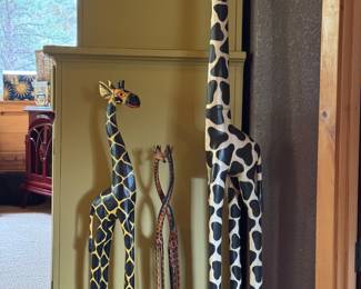 Wooden giraffe sculptures