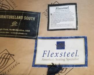 Navy couch with white piping mfg. by Flexsteel