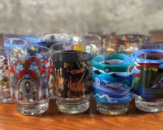 A set of German annual commemorative drinking glasses, designed by Franz Barta. 14 glasses in total. Each glass measures 4.5″ H x 2.75″ W.