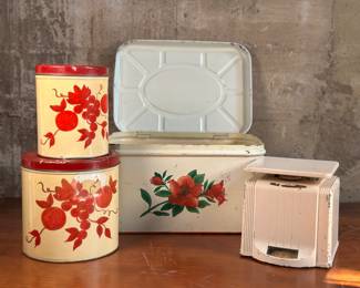 This lot features an antique metal bread box and kitchen scale by Landers, Frary, & Clark. The large container that holds all the pieces measures, 8” H x 13.5” W x 10” D.