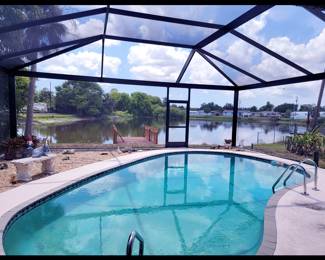 This Gorgeous 3 BD, 2 Bath, Lakefront Pool Home will be on the Market Soon; What a View!