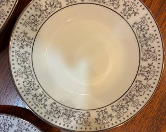 Noritake china with platinum trim. 10 place settings. About 75 pieces total.