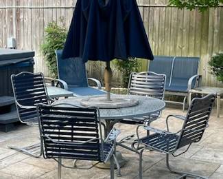 Fantastic Patio Table With Umbrella (the chairs rock)
