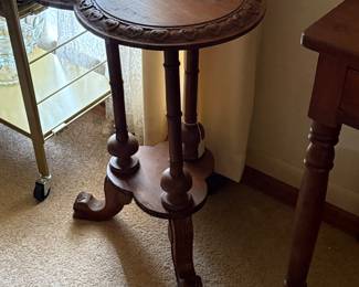 Tripod antique carved table