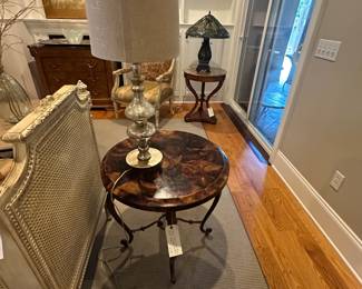 Tortoise shell style table with iron base 
We think it’s maitland smith 
