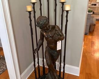 Early bronze statue of boy and seashell with bronze candle stand and candles 