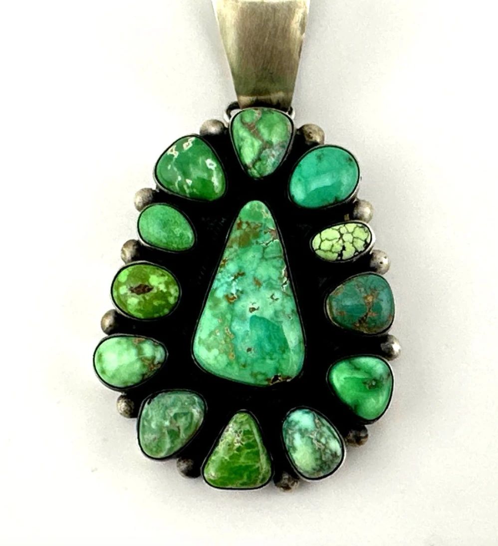 Paul Livingston sterling, turquoise signed Navajo pendant