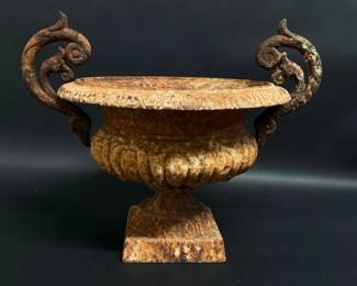 Small cast iron table top garden urn with detached arms