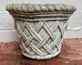 Single cast concrete planter with basket weave decoration