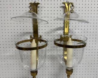 Pair of brass and glass hurricane mounted sconces