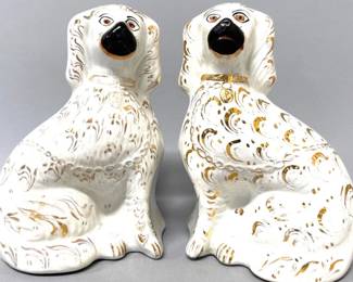 Pair of white and gold Staffordshire Spaniels