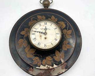 Tole, brass clock