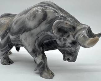 Marble grey and white statue of bull