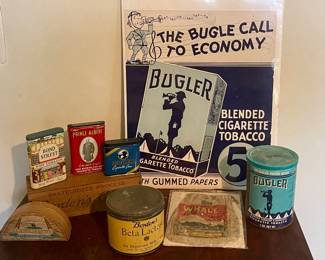 VINTAGE TINS INCLUDING BOND STREET PIPE TOBACCO, PRINCE ALBERT, BUGLER CIGARETTE CASE, BORDEN’S BETA LACTOSE IMPROVED MILK SUGAR , THE BUGLE CALL TO ECONOMY POSTER