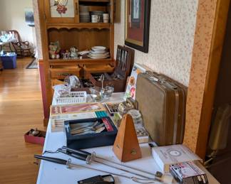 vintage suitcase, binoculars, cuttlery set, kitchen items