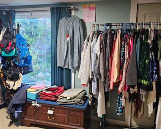 Lots of clothing items, many new with tags, both men's and women