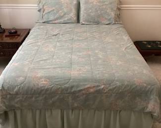 Full Size bed with Green bedspread