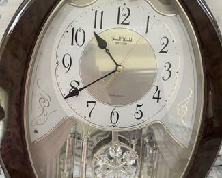 Oval Wall Clock Brown wood casing