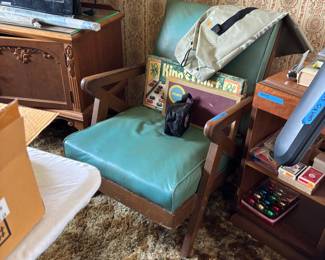 Mid century chair with unusual wood arms