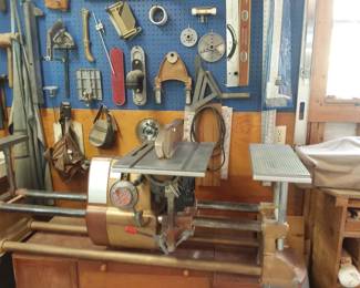 Shop Smith multi-purpose machine with accessories on the wall (manual too)