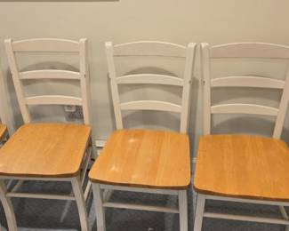 4 sold wood chairs