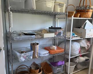 Variety of metal shelving in several rooms - on casters - easy to disassemble and move to your destination.