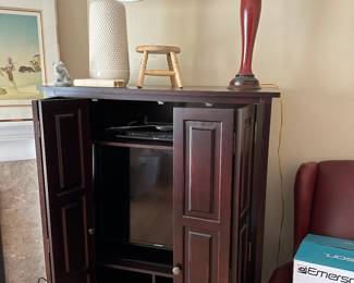 TV Cabinet with folding doors - and Samsung flatscreen relatively new.
