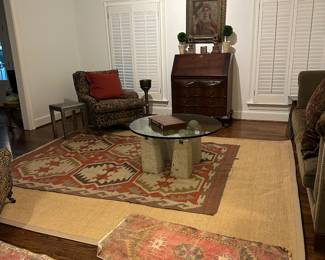 Modernist dining table and vintage persian rugs