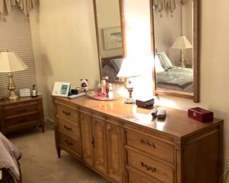 dresser and two mirrors
