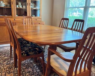Mid Century Table  with 2 hidden leaves, 6 chairs. 4 chairs have original upholstery, 2 have been recovered. 
