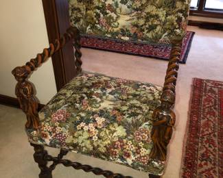 Antique chair carved with figures 