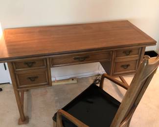 Thomasville desk with a hinged top that opens up and will rotate to make a dining table 