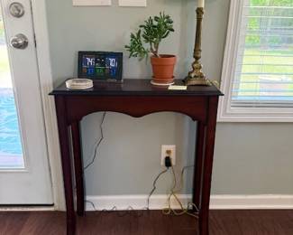 Small console table - perfect for dropping off keys and a lamp to light the way! $40